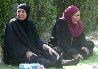 ap_iraq_cryingwomensit.jpg